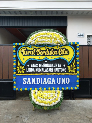 Papan Bunga Duka di Kampung Olo